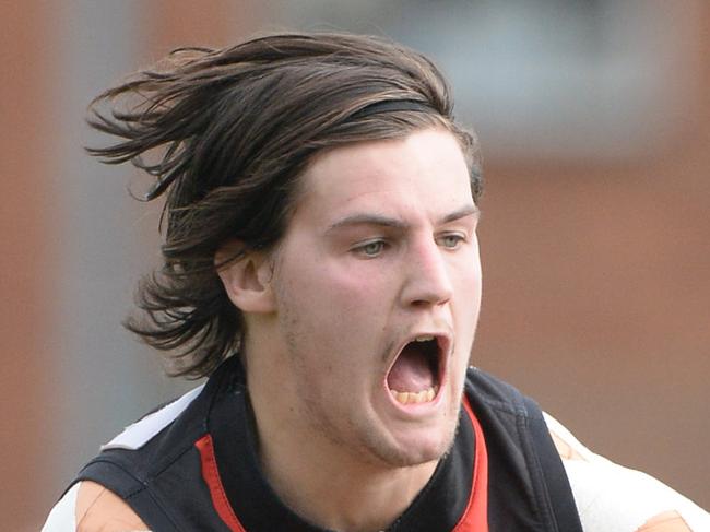 VFL football Frankston v Collingwood at Frankston. Frankston defender Nick Newman battles forpossession with Collingwood's Callum Mathieson.