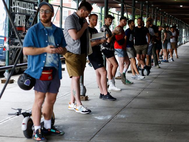 People wait in line to receive the monkeypox vaccine before the opening of a new mass vaccination site at the Bushwick Education Campus in Brooklyn. Picture: AFP