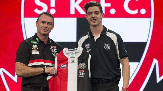 Nick Coffield is greeted by St Kilda coach Alan Richardson after being drafted.