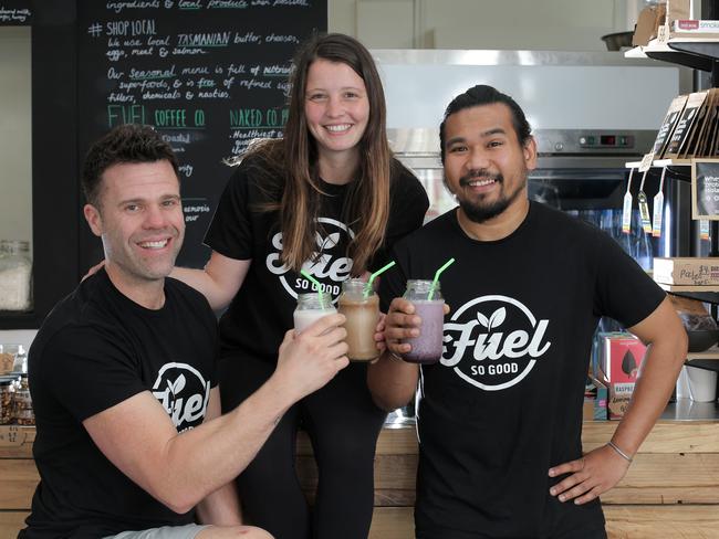 The Fuel So Good team Anthony, left, and Maya Arnold with Najjib Aziz. Picture: LUKE BOWDEN