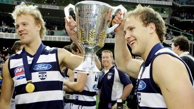 Nathan and Gary Ablett celebrate Geelong’s 2007 premiership win.