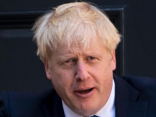 (FILES) In this file photo taken on July 23, 2019 new Conservative Party leader and incoming prime minister Boris Johnson arrives at the Conservative party headquarters in central London. - On July 23, 2019, party members choose Brexit figurehead Boris Johnson as their new leader. He becomes prime minister the next day. (Photo by Niklas HALLE'N / AFP)