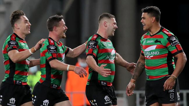 Latrell Mitchell, right, scored a double in Souths’ record-breaking win against Manly. Picture: Getty Images