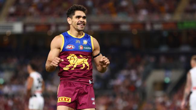 Charlie Cameron celebrates a goal during the round four AFL match between Brisbane Lions and Collingwood Magpies at The Gabba on April 06. (Photo by Chris Hyde/AFL Photos/via Getty Images )