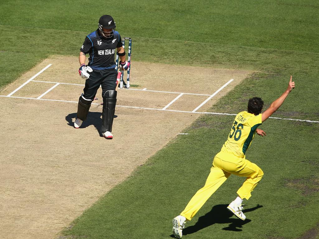 Mitchell Starc celebrates taking the wicket of Brendon McCullum in the 2015 World Cup final at the MCG. Picture: Robert Cianflone/Getty Images
