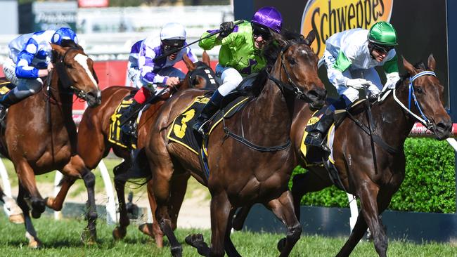 Kerrin McEvoy and Global Glamour finish powerfully to capture the Thousand Guineas. Picture: Getty Images