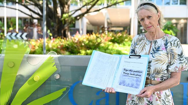 Mooroobool resident Frankie Hogan is urging Cairns citizens to sign the petition against Cairns Regional Council's decision to cease cash transactions at its facilities. Picture: Isaac McCarthy