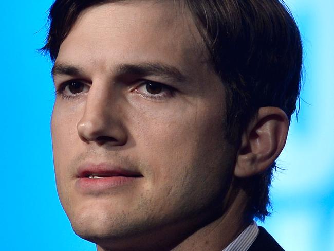 BEVERLY HILLS, CA - NOVEMBER 12: Actor Ashton Kutcher speaks at the Human Rights Watch Voices For Justice Dinner at The Beverly Hilton Hotel on November 12, 2013 in Beverly Hills, California. (Photo by Frazer Harrison/Getty Images)