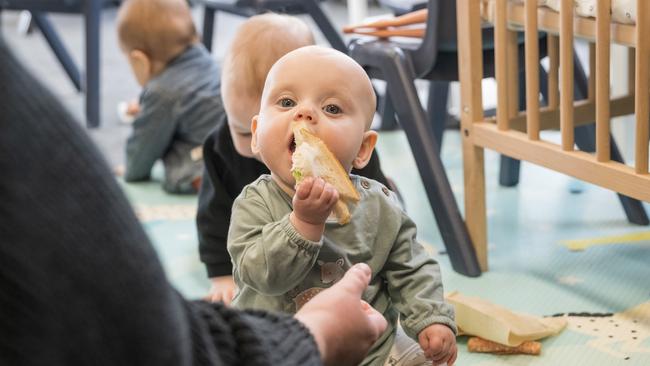 Baby Elliott enjoys the baby-friendly party atmosphere at The Babes' Project's Aquahub launch event. Picture: Richard Annable.