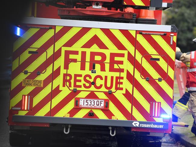 A Queensland Fire Department spokeswoman said firefighters used hydraulic cutting equipment to remove the door of a vehicle and free the driver who was trapped inside.