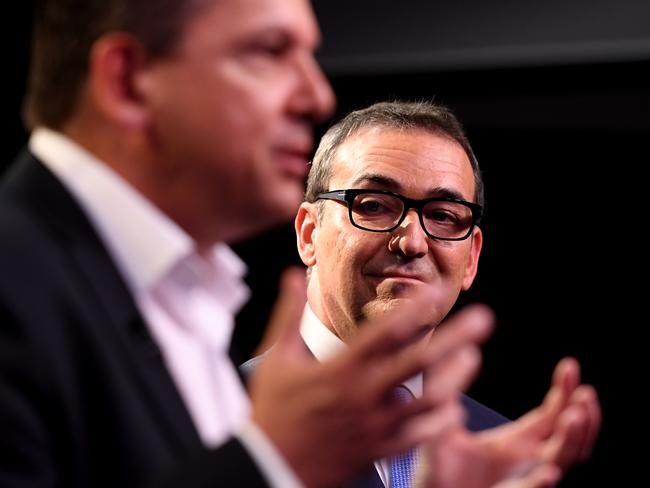 South Australian Liberal leader Steven Marshall (right), and SA-BEST leader Nick Xenophon during the final debate, the Sky News people's forum, at the Grand Central in Elizabeth, Adelaide, Wednesday, March 14, 2018. (AAP Image/Tracey Nearmy) NO ARCHIVING