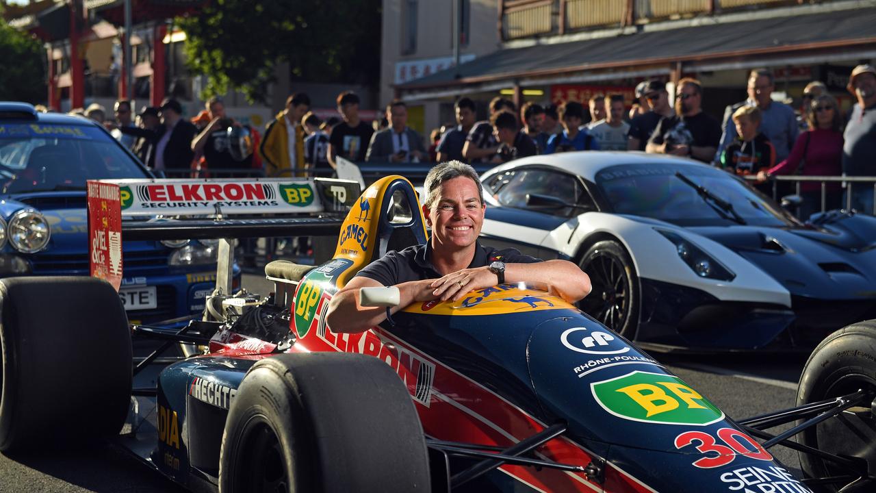 Craig Lowndes with a Lola Larrousse at the Gouger Street Party. Picture: Tom Huntley