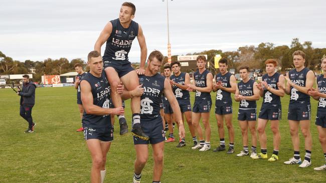 South Adelaide star Joel Cross is chaired off after his 200th game against Norwood. Picture: Cory Sutton