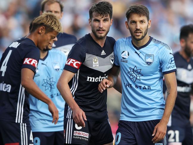 SYDNEY, AUSTRALIA - NOVEMBER 25: Terry Antonis of the Victory and Milos Ninkovic of Sydney FC watch on as they wait for a corner to be taken during the round five A-League match between Sydney FC and Melbourne Victory at WIN Jubilee Stadium on November 25, 2018 in Sydney, Australia. (Photo by Mark Kolbe/Getty Images)