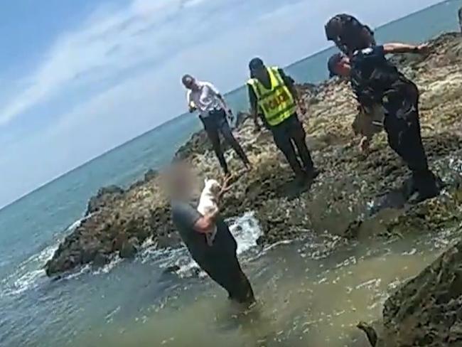 A 39-year-old Trinity Beach man ran into the ocean with his pet French bulldog after absconding from a stolen car at Ellis Beach on Sunday. Picture: QPS