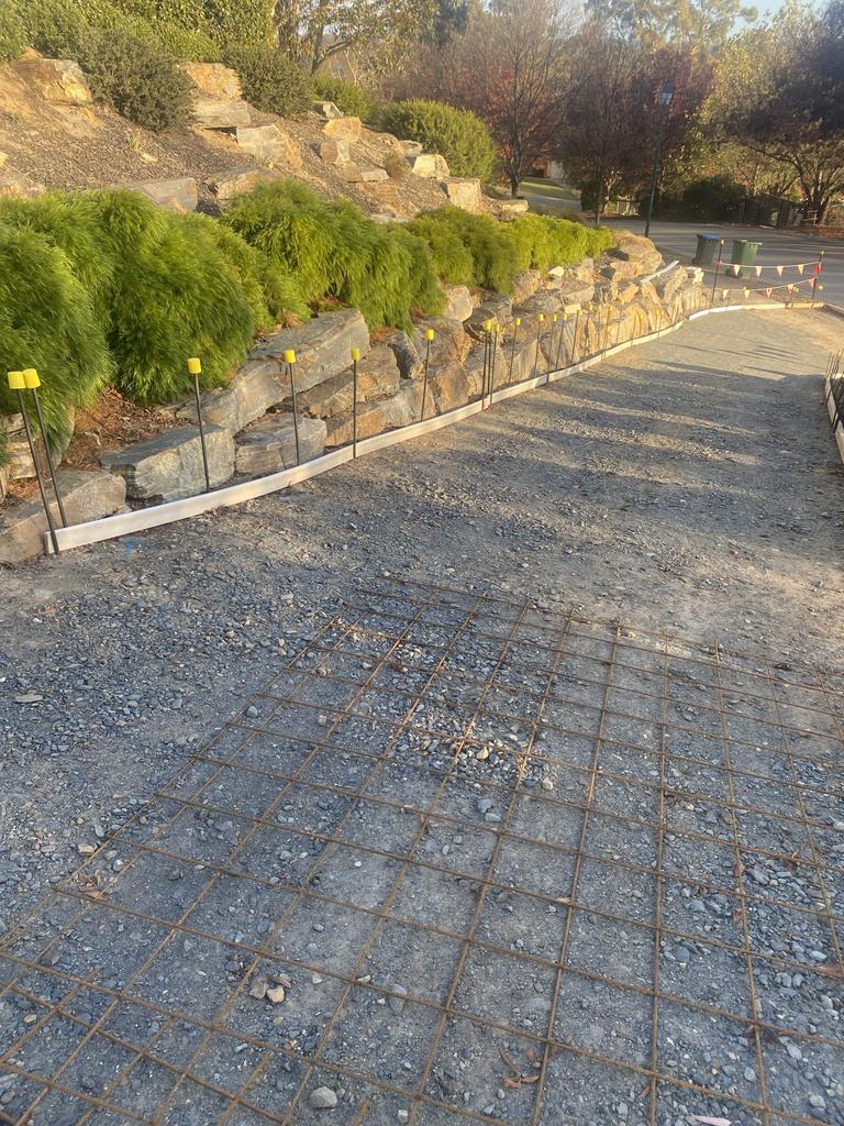 Craig and Paula Miels from Mount Barker are owed nearly $15k for their driveway. Picture: Supplied,