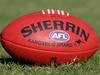 Generic AFL Sherrin football and football boots. sport /