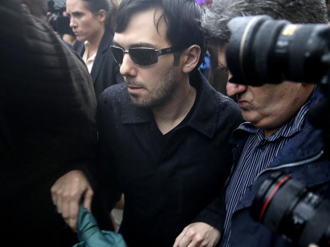 Out ... Martin Shkreli leaves the courthouse after his arraignment in New York. Picture: AP