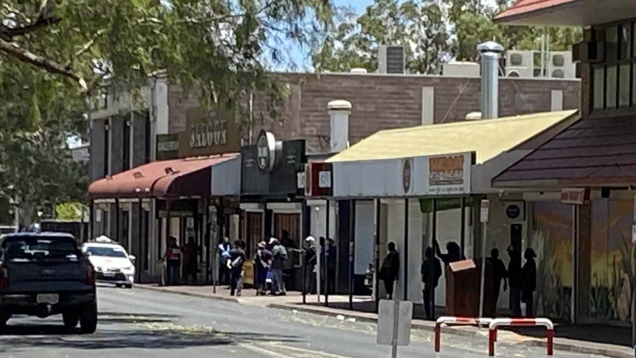 The queue outside an Alice Springs pub waiting for it to open. Picture: Matt Cunningham