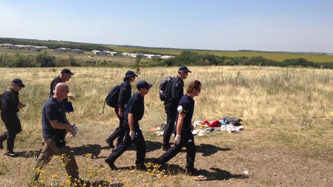 Australian Federal Police at the MH17 crash site in Ukraine. Picture: Paul Toohey.