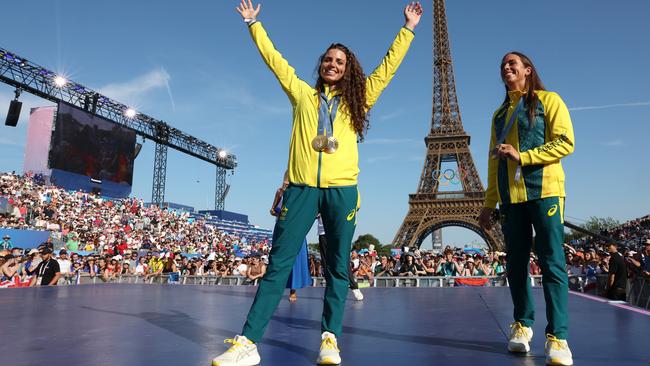 Women's canoe slalom Olympic gold medallists Jessica Fox, left, and sister Noemie in front of the Eiffel Tower in Paris in August. Picture: Getty