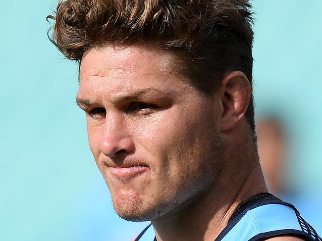 NSW Waratahs player Michael Hooper takes part in a Captain's Run training session at the Sydney Cricket Ground, in Sydney, Friday, March 22, 2019. the Waratahs face the Crusaders at the SCG on Saturday. (AAP Image/Dan Himbrechts) NO ARCHIVING