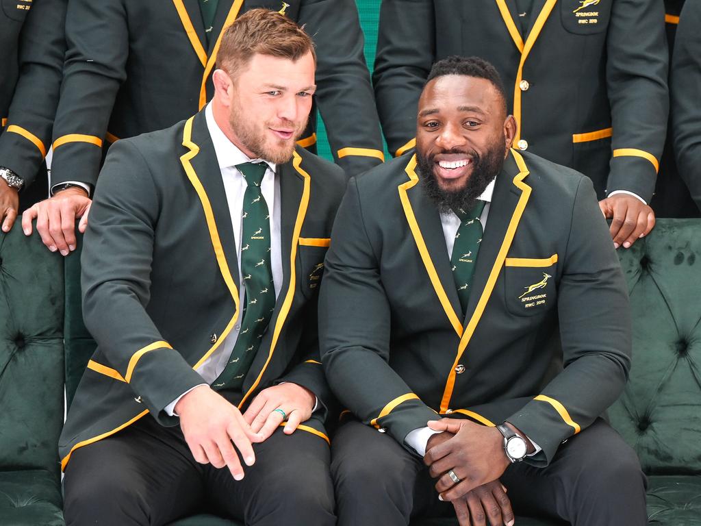 South African Nimber 8 Duane Vermeulen (Bulls) and Zimbabwean born prop Tendai Mtawarira (Sharks) react during a press briefing of the Springbok Rugby World Cup squad announcement. Picture: AFP