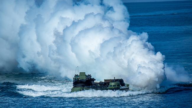 Taiwan’s AAV7 amphibious assault vehicle manoeuvres across the sea during the military exercise. Picture: Annabelle Chih/Getty