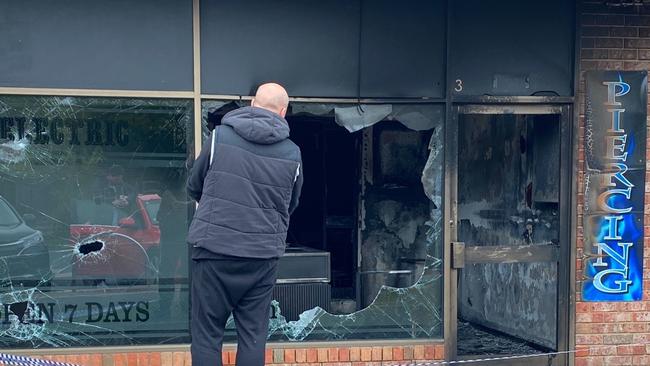 A man surveys the damage to the Old School Tattoo in Shaxton Circle, Frankston on February 20, 2020.