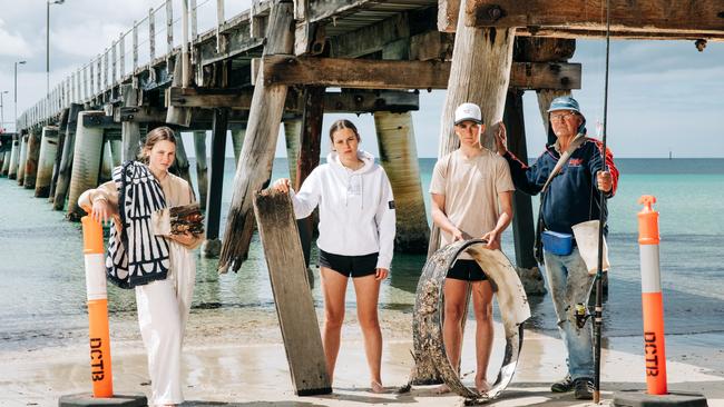 Harry LeBrun, Maisie Curtis, Sadie Curtis Tom Tierney at the Tumby Bay Jetty, which will be closed over summer due to storm damage. Picture: Robert Lang