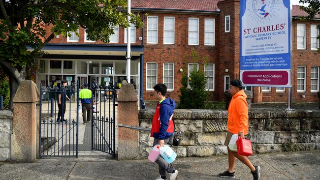 Deep cleaners start work at St Charles Catholic Primary School at Waverly in Sydney. Picture: NCA NewsWire/Joel Carrett