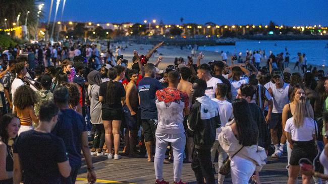 Police were called in to tackle huge crowds on St Kilda beach on November 15. Picture: Wayne Taylor