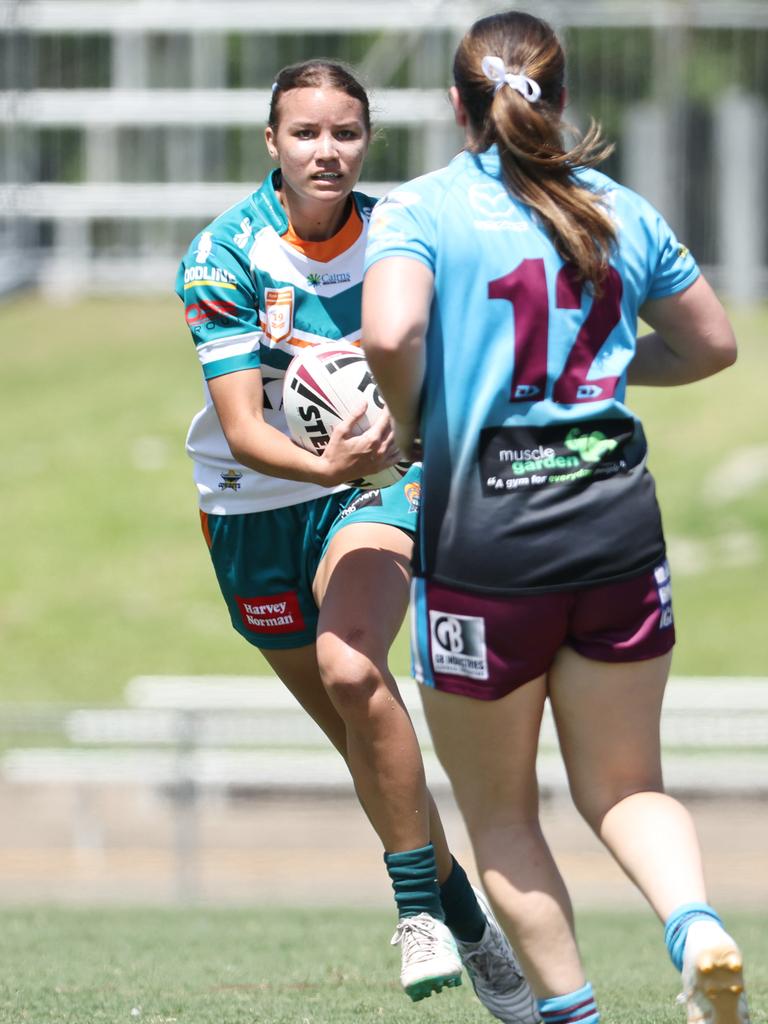 Jordana Woods attacks the line in the Queensland Rugby League (QRL) Under 19 Women's match between the Northern Pride and the Mackay Cutters, held at Barlow Park. Picture: Brendan Radke