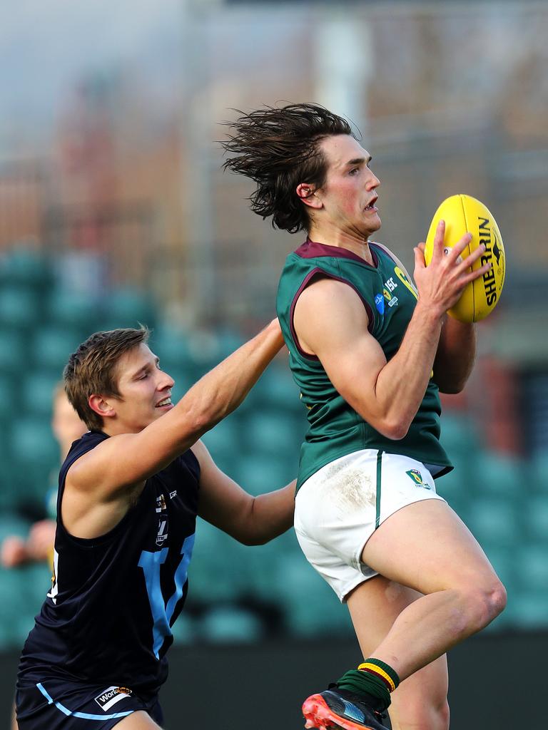 Tasmania Aiden Grace marks during the game against Vic Metro at UTAS Stadium. PICTURE CHRIS KIDD