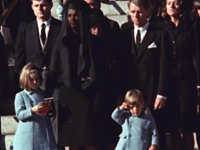 John Kennedy Jr. salutes casket of President Kennedy as it is placed on a caisson outside St. Matthews Cathedral following funeral mass in Washington Nov. 25, 1963. Picture: Supplied.