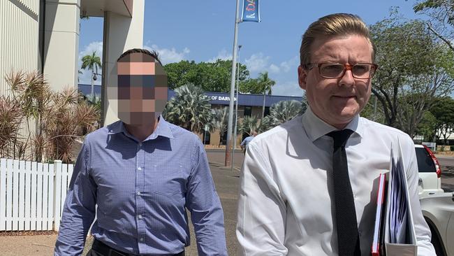 An NT Police officer has been charged with rape. Pictured with his lawyer Luke Officer. Picture: Sarah Matthews