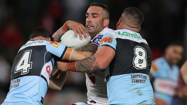 Paul Vaughan is stopped in his tracks as he is tackled. Picture: Getty Images