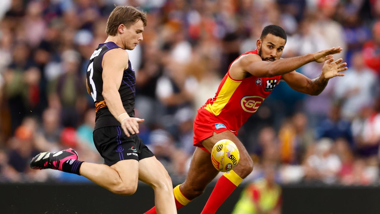 Caleb Serong of the Dockers and Touk Miller of the Suns in Norwood. Photo by Michael Willson/AFL Photos via Getty Images.