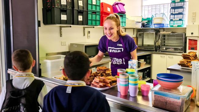 Breakfasts being served by Foodbank Queensland to students at Ipswich Central State School.