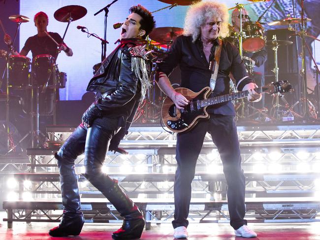 Adam Lambert performing with Queen.