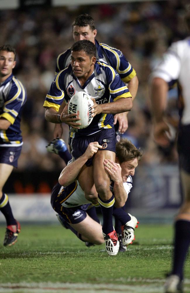 Matt Bowen gets tackled by Brent Tate.
