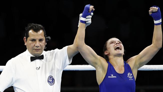 Australia's Skye Nicolson celebrates her victory against Northern Ireland's Michaela Walsh during their women's 57kg final boxing match during the 2018 Gold Coast Commonwealth Games at the Oxenford Studios venue on the Gold Coast on April 14, 2018. Picture: AFP PHOTO