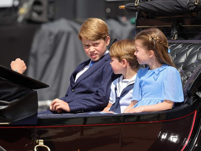 Prince George is grieving the loss of the Queen differently than his younger brother Louis and sister Charlotte. Picture: AFP.