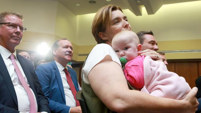 Member for Macalister Melissa McMahon (front right) with baby Mackenzie at Parliament for the first Labor caucus meeting of the 56th Parliament. Picture: AAP/Sarah Marshall