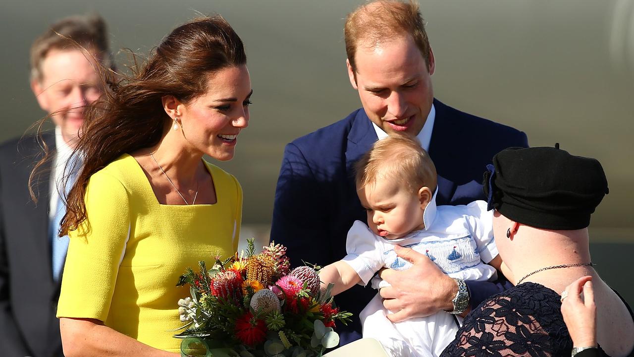 The Duke and Duchess of Cambridge and Prince George meet dignitaries upon arriving at Sydney Airport on April 16, 2014. Picture: Ryan Pierse/Getty Images