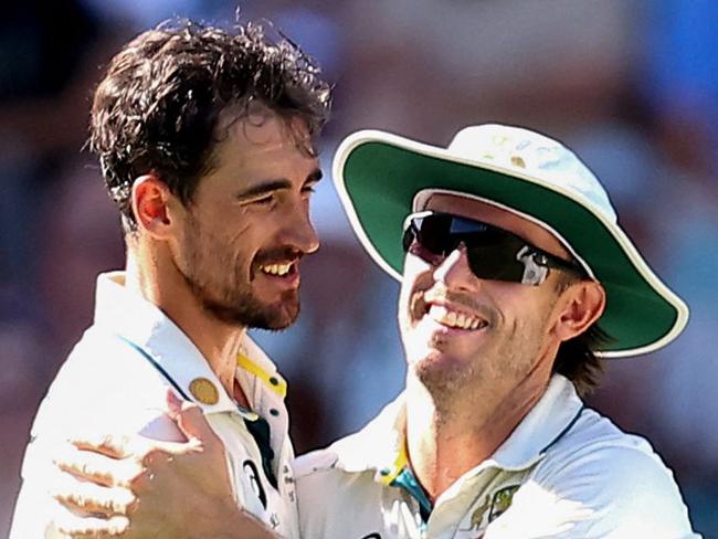 Mitch Marsh celebrates after Mitchell Starc of Australia reaches his 300th Test wicket during day one of the second cricket Test match between Australia and West Indies at the Gabba in Brisbane on January 25, 2024. (Photo by Pat Hoelscher / AFP) / -- IMAGE RESTRICTED TO EDITORIAL USE - STRICTLY NO COMMERCIAL USE --