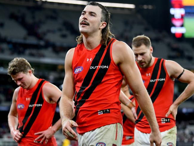 MELBOURNE, AUSTRALIA - JULY 13: Sam Draper of the Bombers looks dejected after losing the round 18 AFL match between Melbourne Demons and Essendon Bombers at Melbourne Cricket Ground, on July 13, 2024, in Melbourne, Australia. (Photo by Josh Chadwick/AFL Photos/via Getty Images)