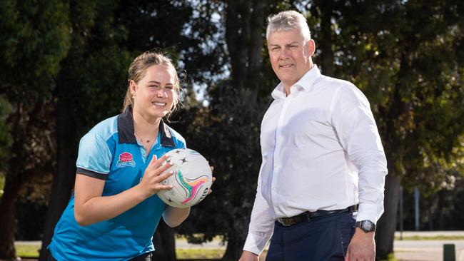 Netballer Audrey Little and her father, former Wallaby Jason Little. Audrey has been selected as part of the first ever Swifts Academy.