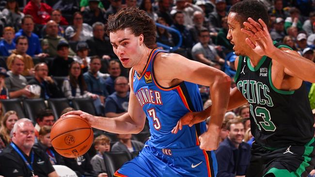 OKLAHOMA CITY, OK - JANUARY 3: Josh Giddey #3 of the Oklahoma City Thunder drives to the basket during the game against the Boston Celtics on January 3, 2023 at Paycom Arena in Oklahoma City, Oklahoma. NOTE TO USER: User expressly acknowledges and agrees that, by downloading and or using this photograph, User is consenting to the terms and conditions of the Getty Images License Agreement. Mandatory Copyright Notice: Copyright 2023 NBAE (Photo by Zach Beeker/NBAE via Getty Images)