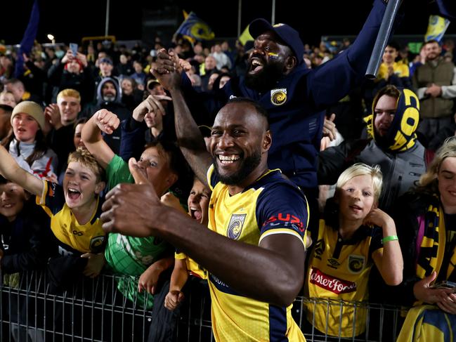 Mariners favourite Brian Kaltak celebrates with fans after full-time. Picture: Getty Images